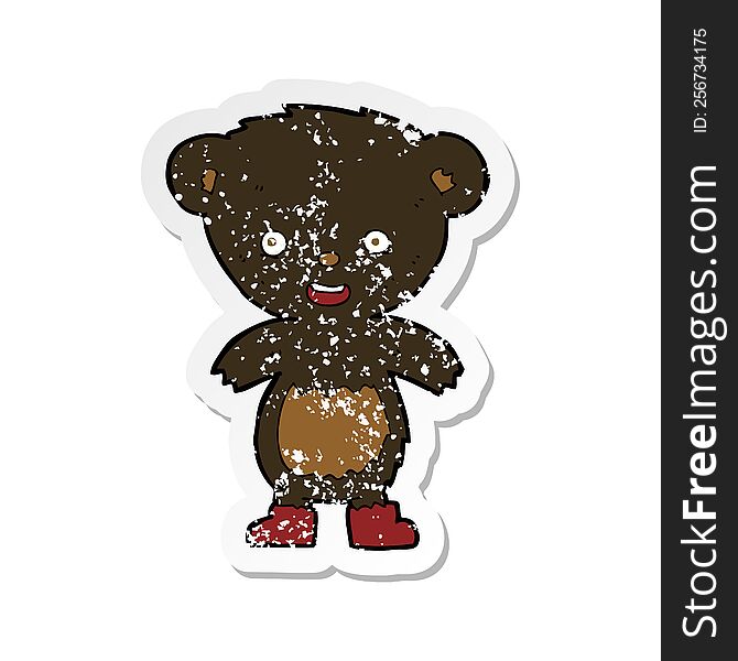 Retro Distressed Sticker Of A Cartoon Black Bear Cub
