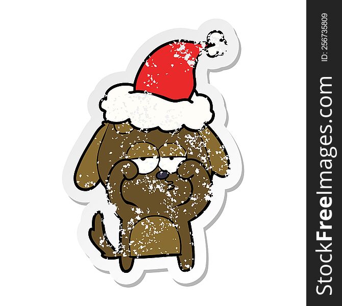 Distressed Sticker Cartoon Of A Tired Dog Wearing Santa Hat