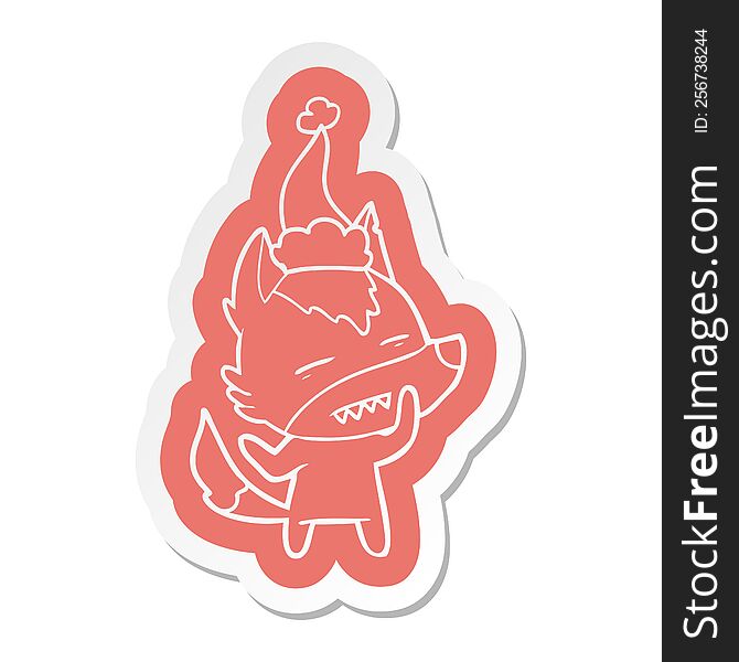 quirky cartoon  sticker of a wolf showing teeth wearing santa hat