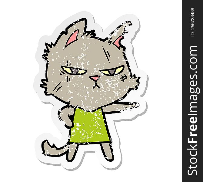 distressed sticker of a tough cartoon cat girl pointing