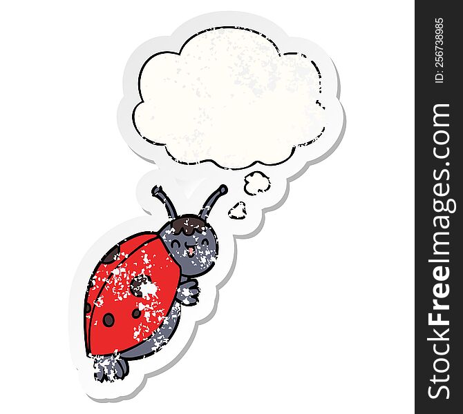 cute cartoon ladybug with thought bubble as a distressed worn sticker