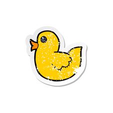 Retro Distressed Sticker Of A Cartoon Rubber Duck Royalty Free Stock Photography