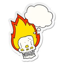 Spooky Cartoon Flaming Skull And Thought Bubble As A Printed Sticker Royalty Free Stock Photo