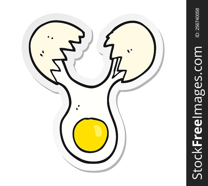 sticker of a cartoon cracked egg