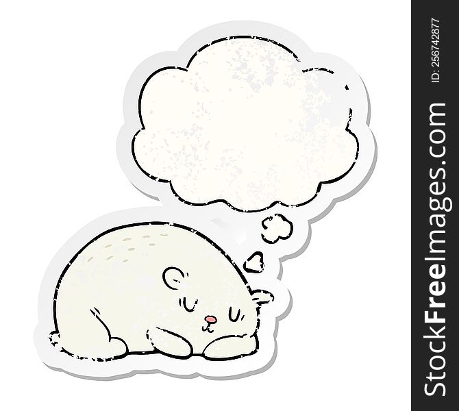 cartoon polar bear with thought bubble as a distressed worn sticker