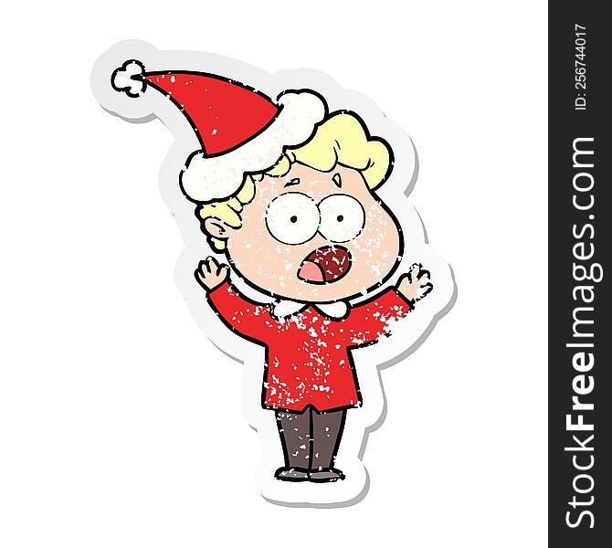 hand drawn distressed sticker cartoon of a man gasping in surprise wearing santa hat