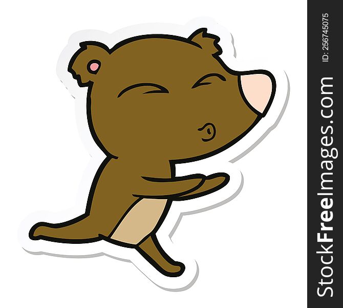 sticker of a cartoon running bear