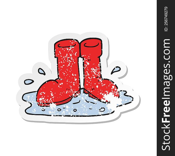 retro distressed sticker of a cartoon wellington boots in puddle