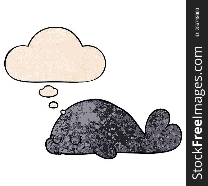 cute cartoon seal with thought bubble in grunge texture style. cute cartoon seal with thought bubble in grunge texture style