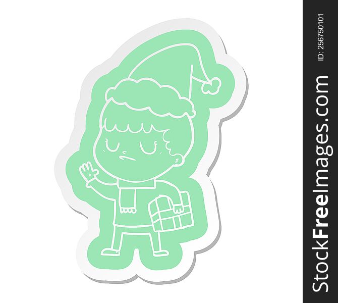 quirky cartoon  sticker of a grumpy boy wearing santa hat