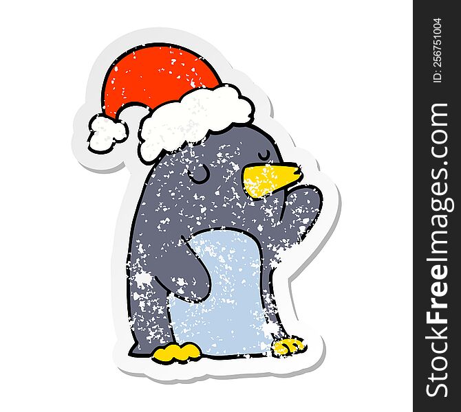 distressed sticker of a cute cartoon christmas penguin