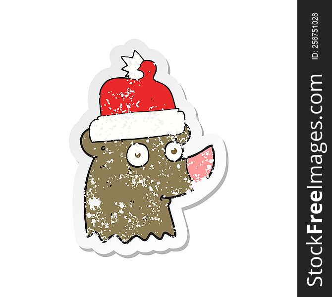 Retro Distressed Sticker Of A Cartoon Bear Wearing Christmas Hat
