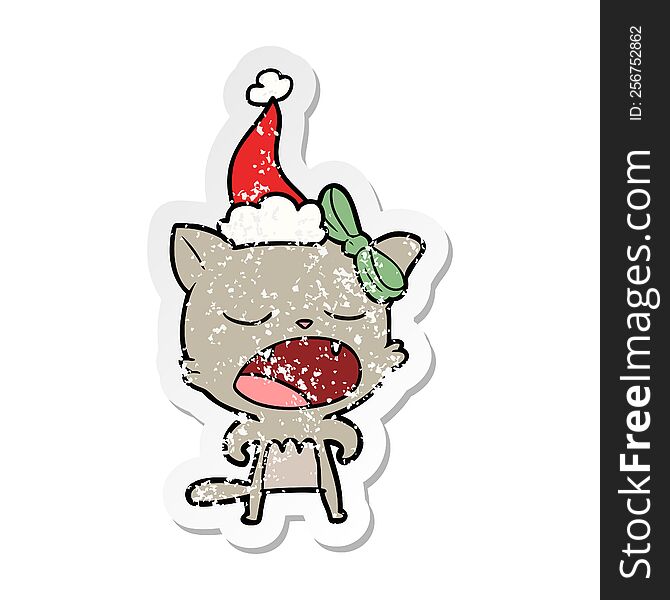 Distressed Sticker Cartoon Of A Cat Meowing Wearing Santa Hat
