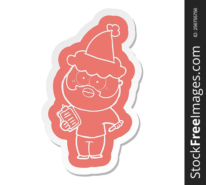 quirky cartoon  sticker of a bearded man with clipboard and pen wearing santa hat