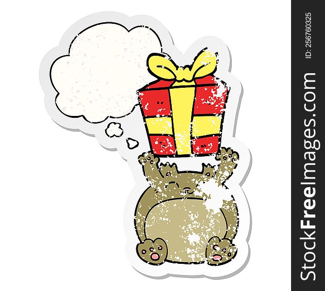 cute cartoon christmas bear with thought bubble as a distressed worn sticker