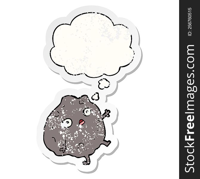 cartoon rock falling with thought bubble as a distressed worn sticker