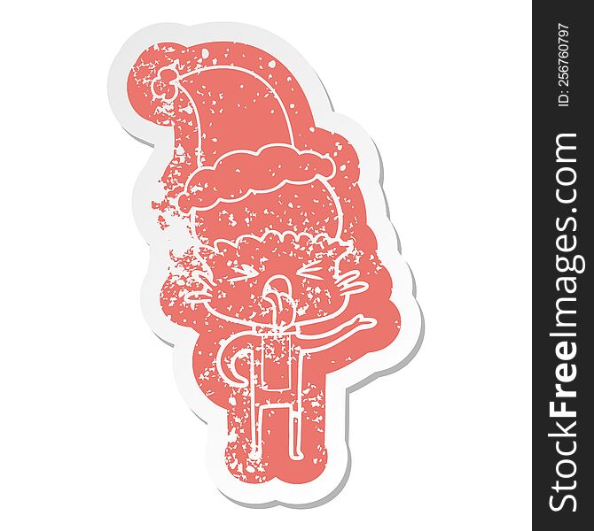 Disgusted Cartoon Distressed Sticker Of A Alien Wearing Santa Hat