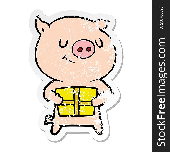 Distressed Sticker Of A Happy Cartoon Pig With Christmas Present