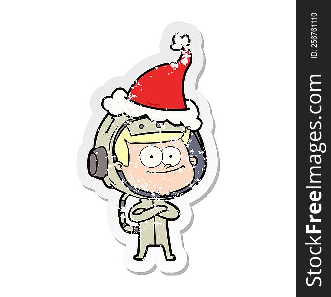 Happy Astronaut Distressed Sticker Cartoon Of A Wearing Santa Hat