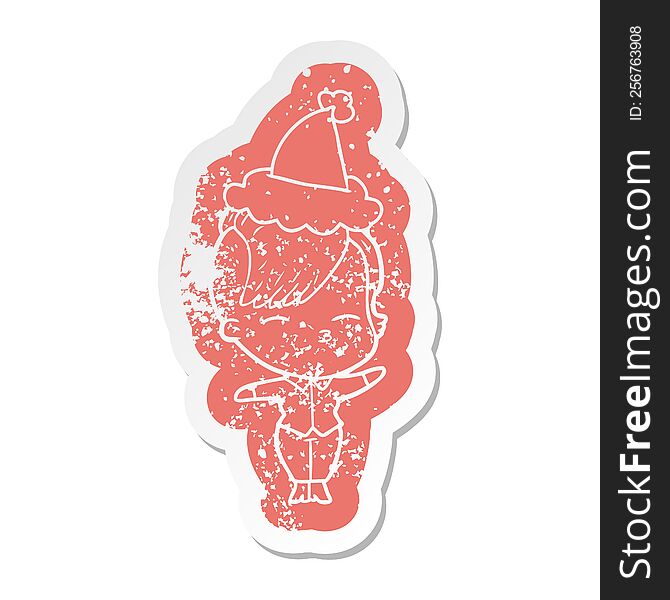 quirky cartoon distressed sticker of a squinting girl wearing santa hat