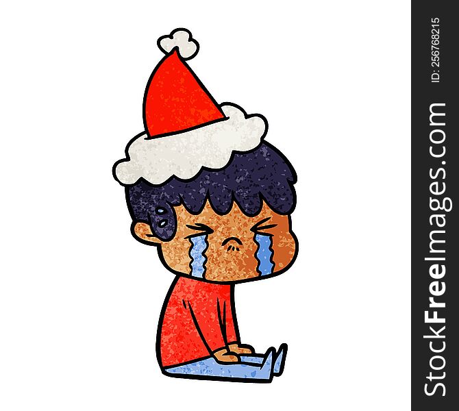 hand drawn textured cartoon of a boy crying wearing santa hat