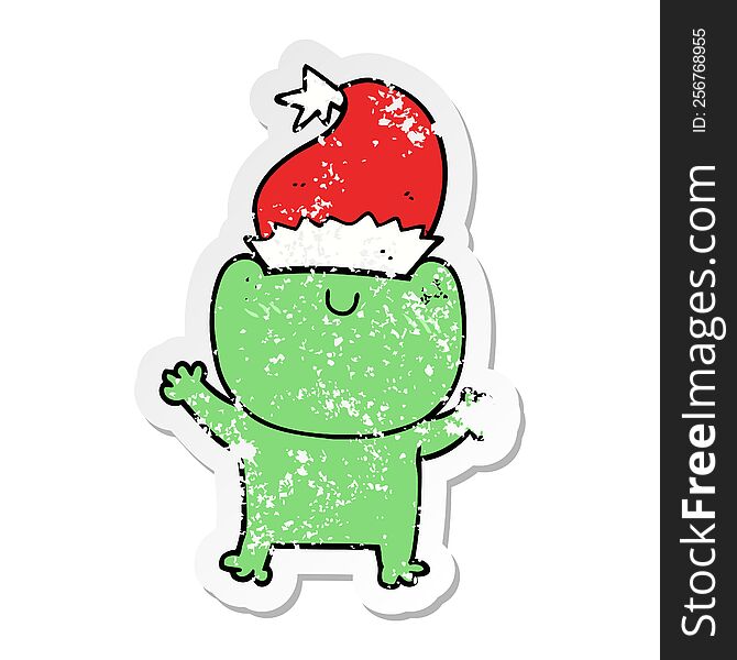 Distressed Sticker Of A Cute Cartoon Frog Wearing Christmas Hat