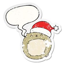 Cute Cartoon Christmas Bear And Speech Bubble Distressed Sticker Stock Photo