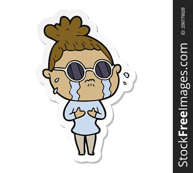 sticker of a cartoon crying woman wearing dark glasses