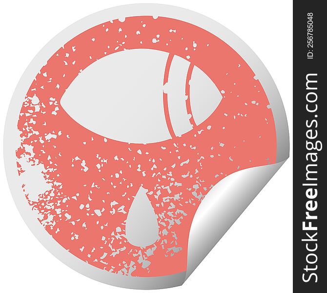 distressed circular peeling sticker symbol of a crying eye looking to one side