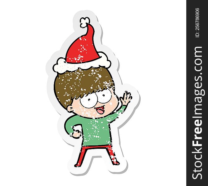 happy hand drawn distressed sticker cartoon of a boy wearing santa hat. happy hand drawn distressed sticker cartoon of a boy wearing santa hat