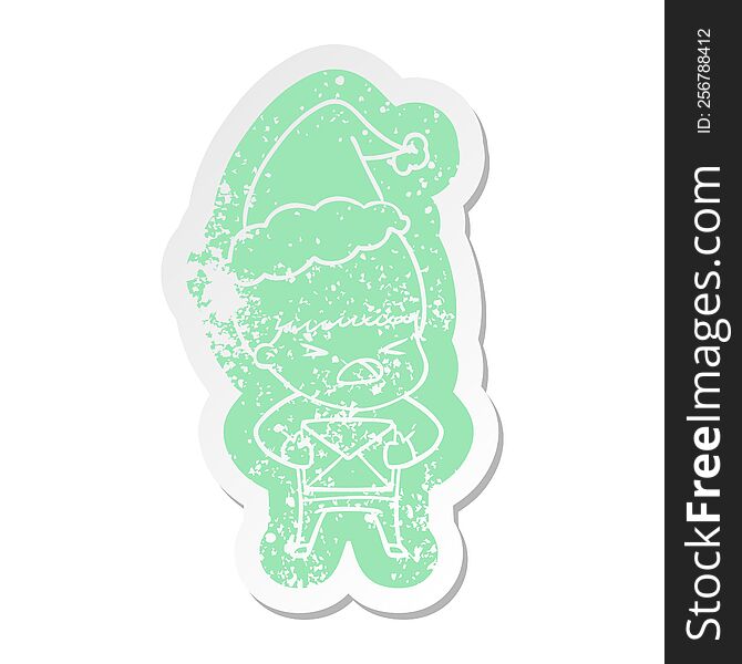 quirky cartoon distressed sticker of a stressed man wearing santa hat