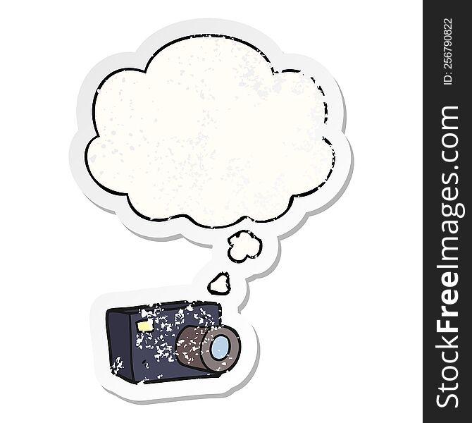 cartoon camera with thought bubble as a distressed worn sticker