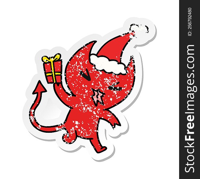 hand drawn christmas distressed sticker cartoon of kawaii devil