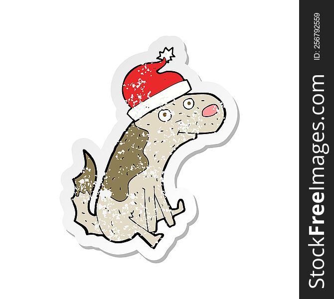 retro distressed sticker of a cartoon dog in christmas hat