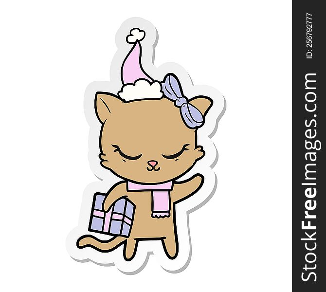 Cute Sticker Cartoon Of A Cat With Present Wearing Santa Hat