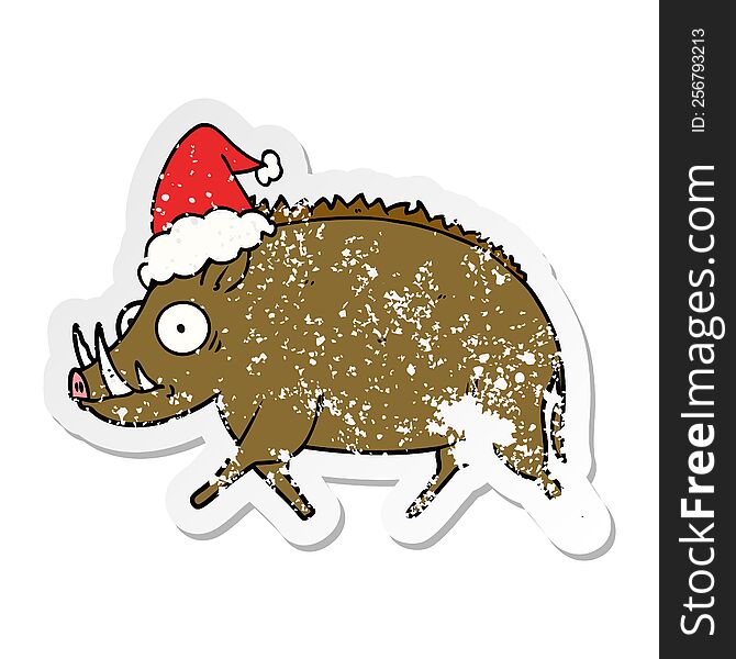 distressed sticker cartoon of a wild boar wearing santa hat