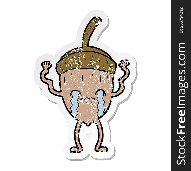distressed sticker of a cartoon crying acorn