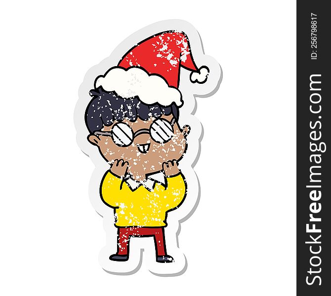 distressed sticker cartoon of a boy wearing spectacles wearing santa hat