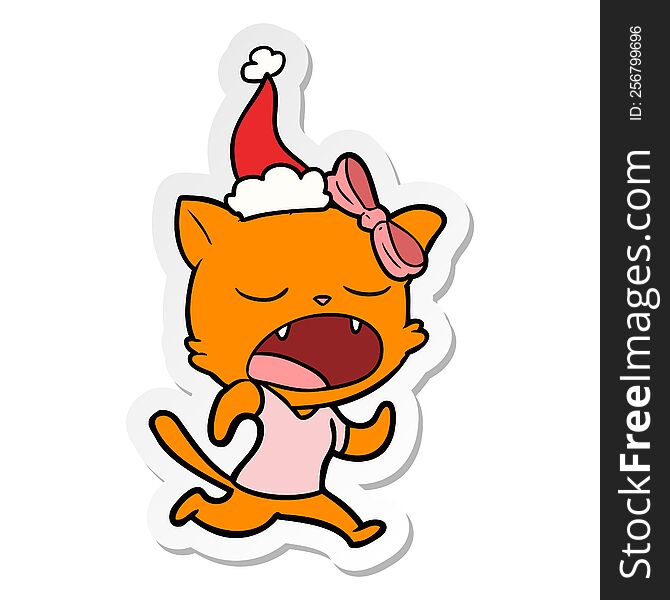 hand drawn sticker cartoon of a yawning cat wearing santa hat