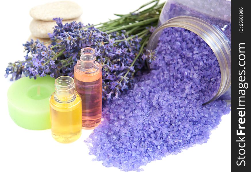 Lavender bath salt, cosmetics and fresh lavender on a white background. Lavender bath salt, cosmetics and fresh lavender on a white background