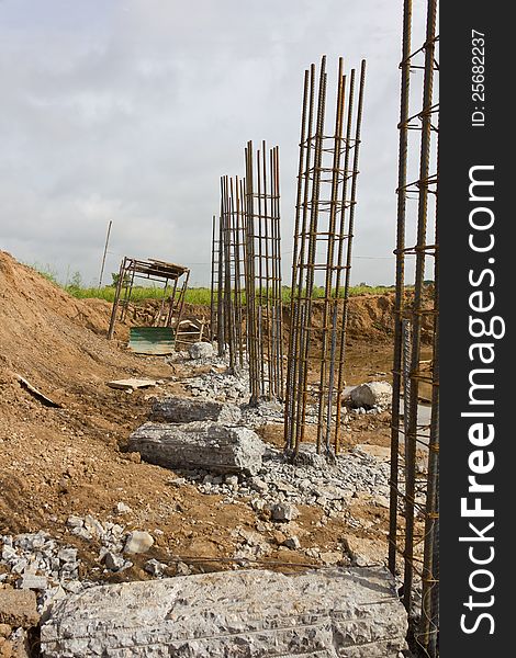 Broken concrete to the steel piles of concrete that is buried into the soil. Broken concrete to the steel piles of concrete that is buried into the soil.