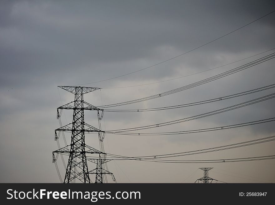 High voltage towers in storm. High voltage towers in storm.