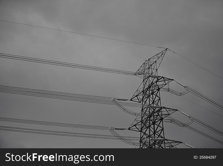 High voltage towers in storm. High voltage towers in storm.