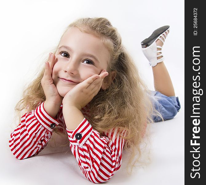 Cheerful little girl smile. White isolated.