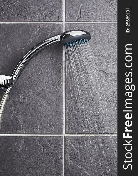 Shower in contemporary grey tiled bathroom. Shower in contemporary grey tiled bathroom
