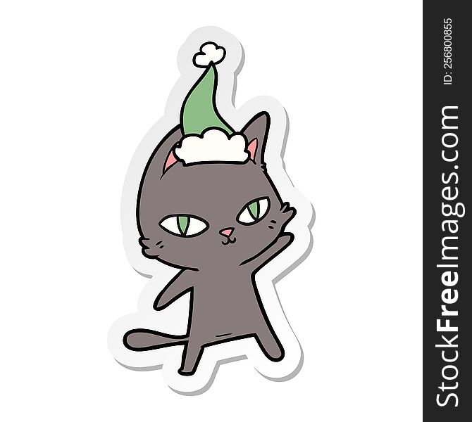 hand drawn sticker cartoon of a cat staring wearing santa hat