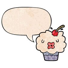 Funny Cartoon Cupcake And Speech Bubble In Retro Texture Style Stock Photography