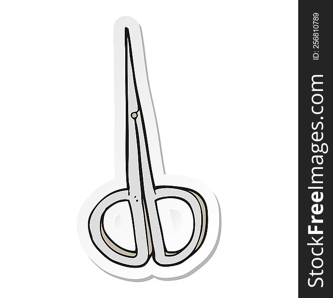 sticker of a cartoon nail scissors