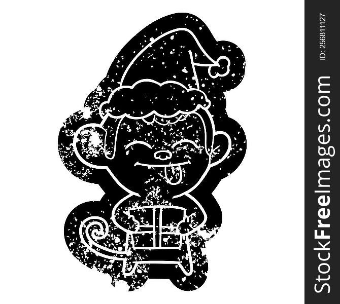 funny quirky cartoon distressed icon of a monkey with christmas present wearing santa hat