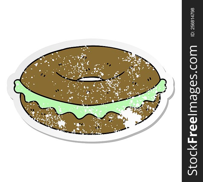 Distressed Sticker Of A Quirky Hand Drawn Cartoon Bagel